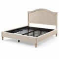 Lit double en tissu beige avec cadre en métal et pieds en bois