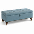 Banc de rangement en tissu bleu avec pieds en bois